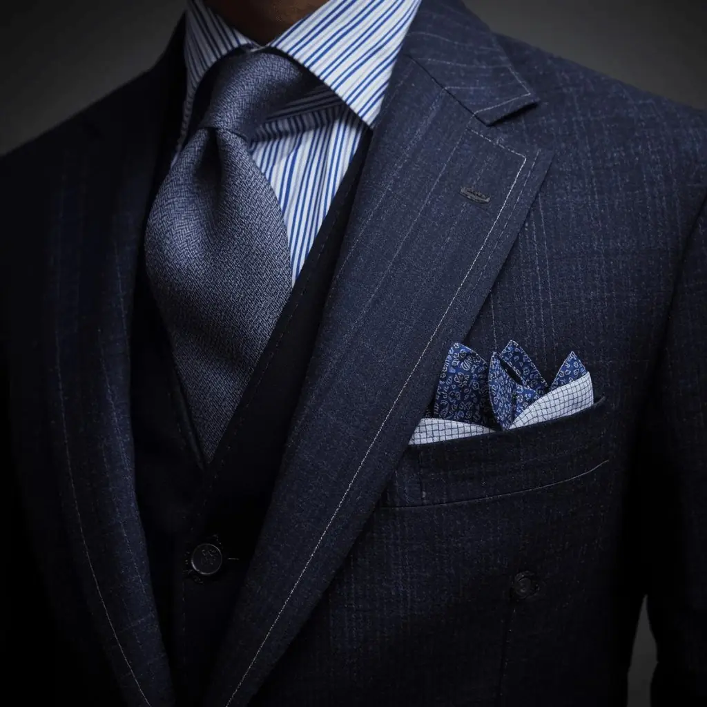 Close-up of a custom navy pinstripe suit and pocket square by The Suit Doctor in Kansas City